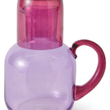 Kip & Co Lilac Fiesta glass and carafe set, featuring a vibrant lilac-colored glass and matching carafe for serving drinks.