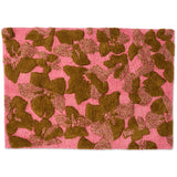 Kip & Co Bloom bath mat featuring colorful floral design, soft absorbent material, and non-slip backing for safe bathroom use.