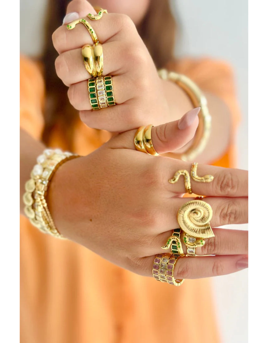 Mosk Melbourne Ivy Ring featuring intricate gold band with detailed leaf and vine design, elegant jewelry accessory.