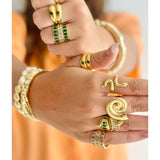 Mosk Melbourne Ivy Ring featuring intricate gold band with detailed leaf and vine design, elegant jewelry accessory.