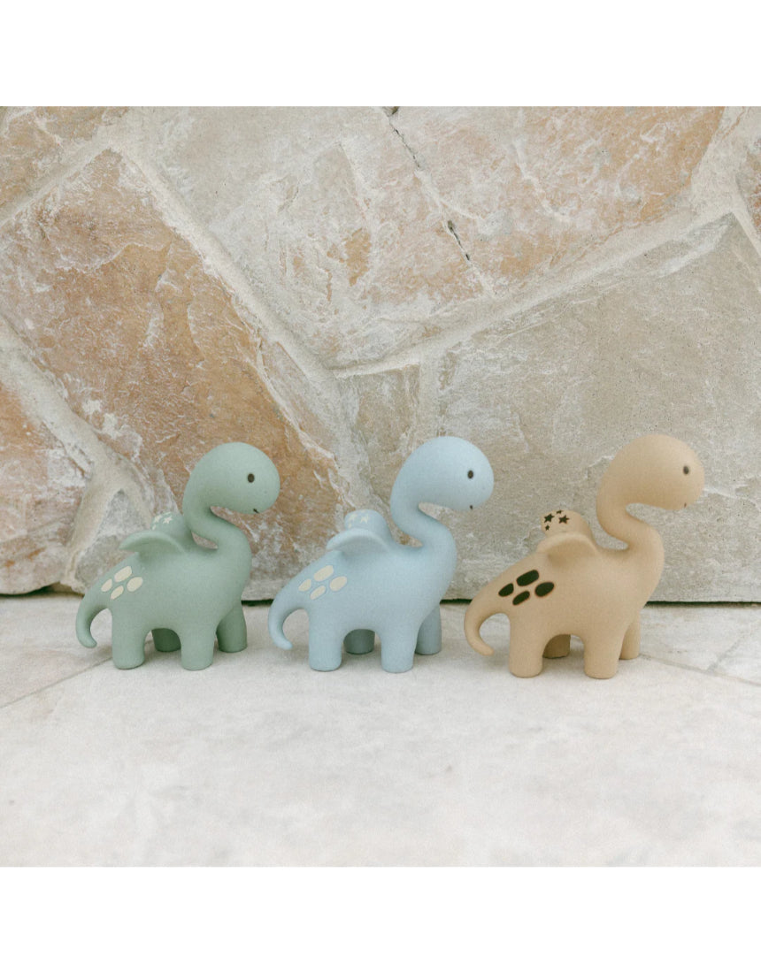 Blue Diplo the Dino-Dragon teether by Winnie Parkes, soft and textured silicone teething toy for infants.
