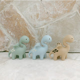 Blue Diplo the Dino-Dragon teether by Winnie Parkes, soft and textured silicone teething toy for infants.