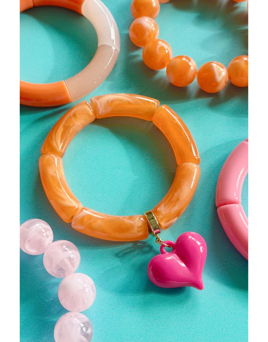 Mosk Melbourne Big Heart bracelet featuring a silver chain and a prominent heart charm on a white background.