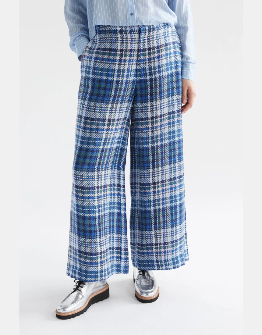 Elk Ranie Pant in blue multi-check pattern, casual pants with a relaxed fit, shown on a model.