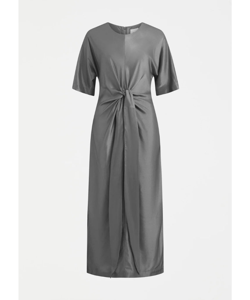 Elk Lissu Dress in silver and black, stylish clothing with a flowing design, displayed on a hanger.