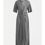 Elk Lissu Dress in silver and black, stylish clothing with a flowing design, displayed on a hanger.