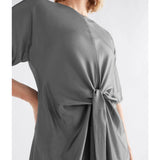 Elk Lissu Dress in silver and black, showcasing a stylish, flowing clothing design with a relaxed fit and elegant details.