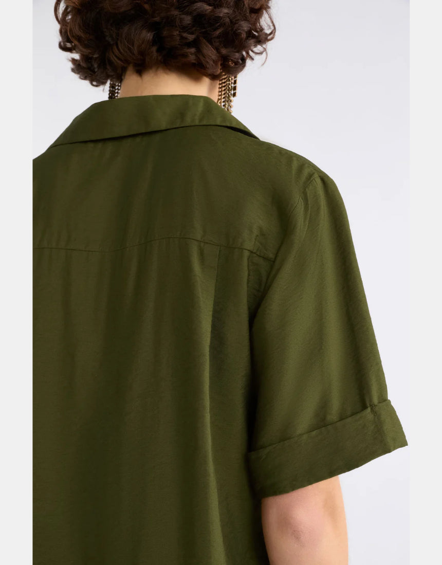 Elk Eine Bright Olive shirt in a natural fit, featuring a bright olive color and casual style, displayed on a hanger.