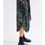 Elk Kallio Dress in Norda print, lightweight clothing with a relaxed fit, featuring a floral pattern and short sleeves.