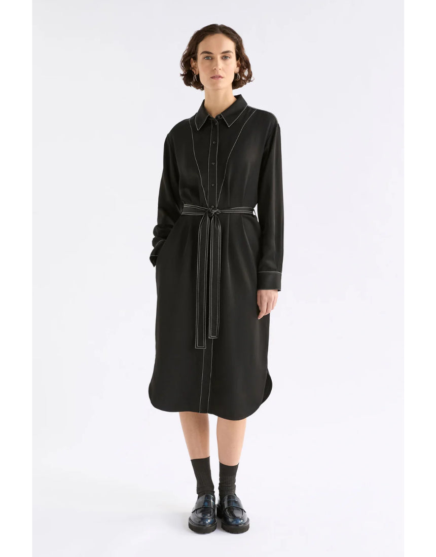 Elk Famke black dress, stylish women's clothing with a fitted silhouette, shown on a model against a neutral background.