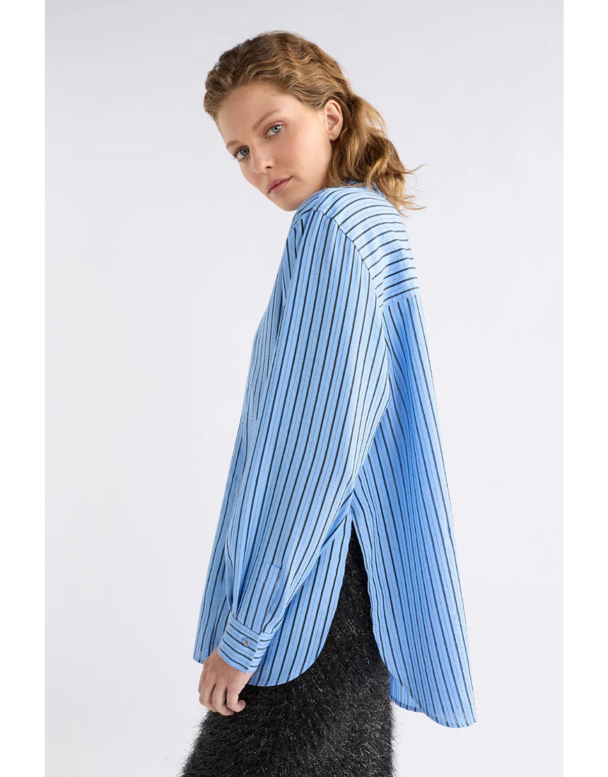 Elk Hedi shirt in chambray stripe featuring a casual button-up design and long sleeves, displayed on a neutral background.