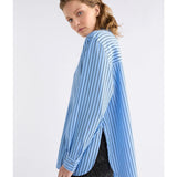 Elk Hedi shirt in chambray stripe featuring a casual button-up design and long sleeves, displayed on a neutral background.