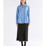 Elk Hedi shirt in chambray stripe with long sleeves, button-up front, and collar, displayed on a neutral background.