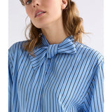 Elk Hedi Shirt in chambray with blue and white stripe pattern, casual men's clothing, front view showing collar and button details.