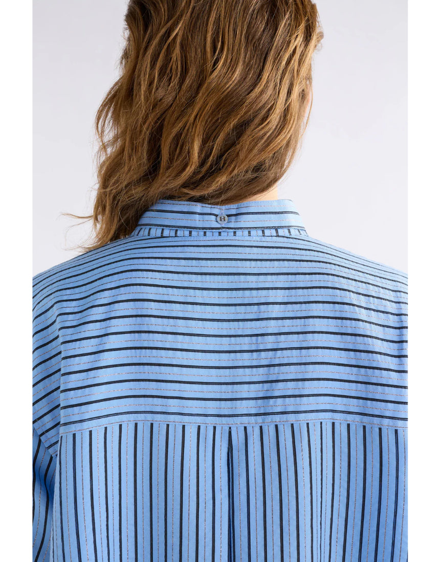 Elk Hedi Shirt in chambray stripe with a classic collar, button-front, and long sleeves, displayed on a neutral background.