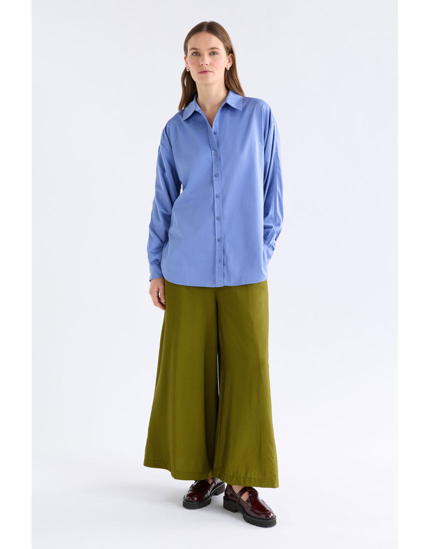 ELK The Label Sol Shirt in Dusk Blue, a stylish women's top with a relaxed fit and soft fabric, detailed in the image.