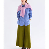 ELK The Label Sol Shirt in Dusk Blue, a stylish blue tops with a relaxed fit, shown on a model.