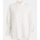 White Elk Sol Shirt by ELK The Label, a stylish women's top with a relaxed fit and clean design, perfect for casual wear.