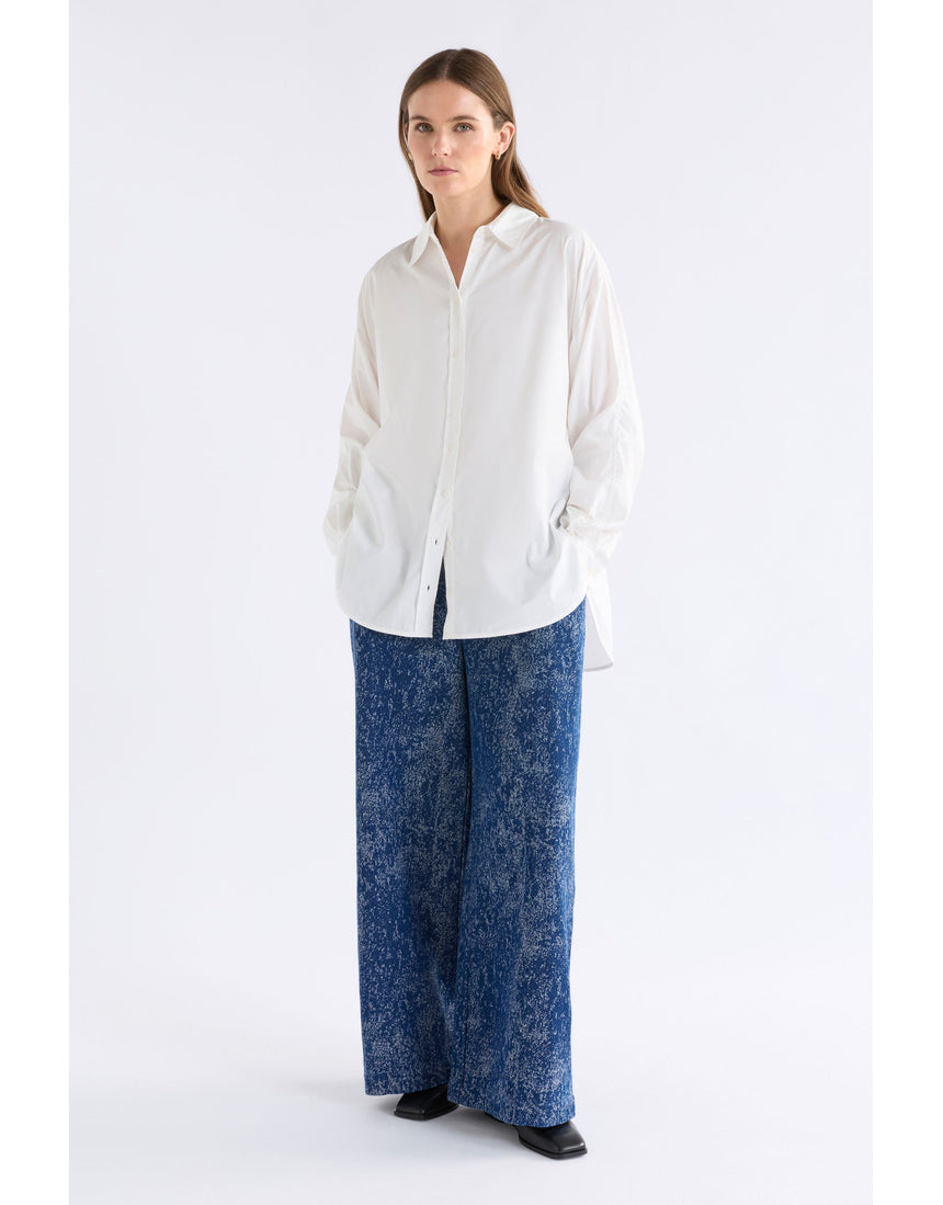 White Elk Sol Shirt from ELK The Label, a stylish women's top with a relaxed fit and minimal design.