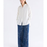 White Elk Sol Shirt from ELK The Label, a stylish women's top with a relaxed fit and minimal design.
