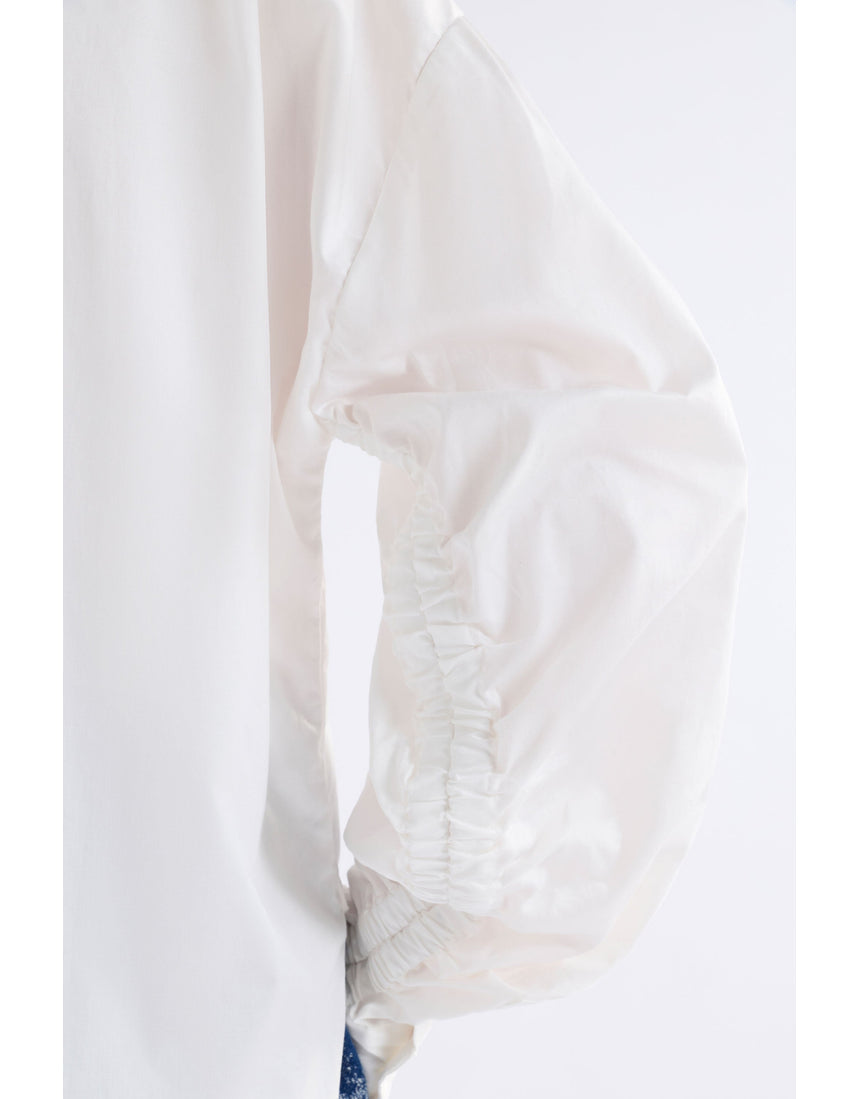 White Elk Sol Shirt by ELK The Label, a stylish long-sleeve top with a relaxed fit and minimalist design.
