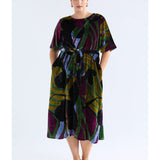 ELK The Label Reihen Dress in Stribe Burnout with a relaxed fit and floral pattern, shown on a model.