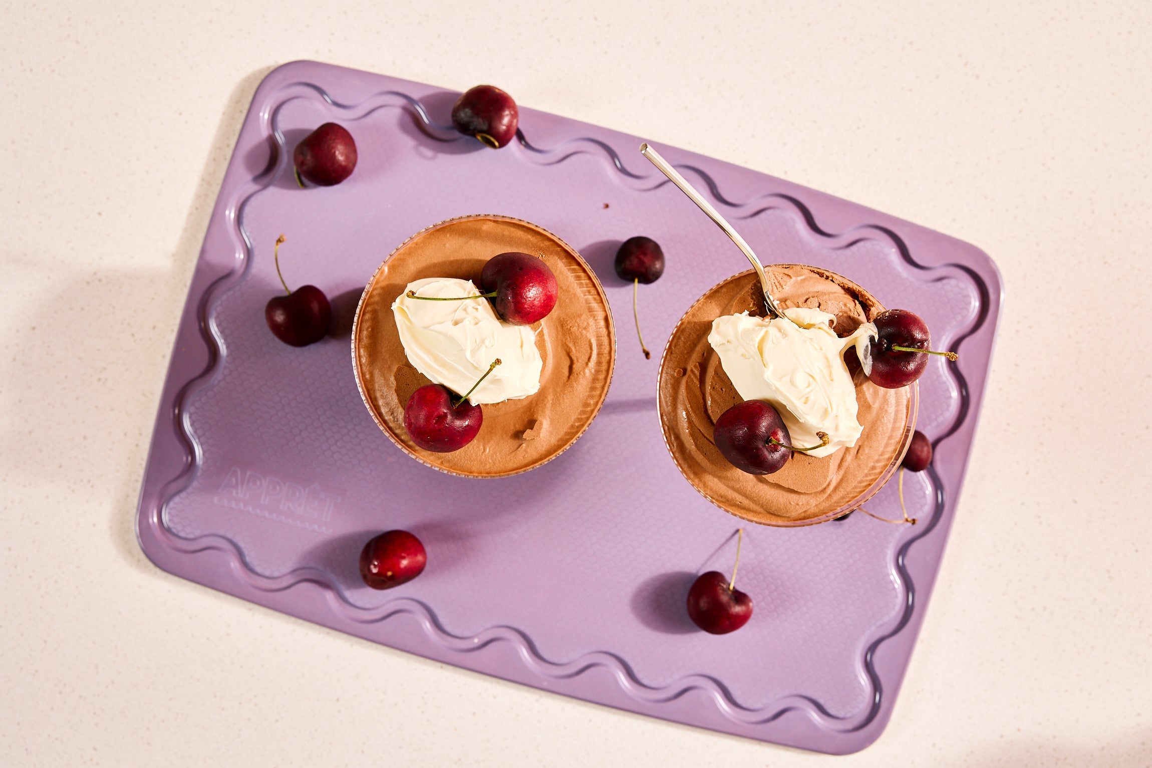 Maison Apprêt Classique Lilac chopping board with smooth wooden surface and rounded edges, ideal for food preparation.