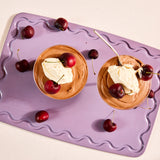 Maison Apprêt Classique Lilac chopping board with smooth wooden surface and rounded edges, ideal for food preparation.