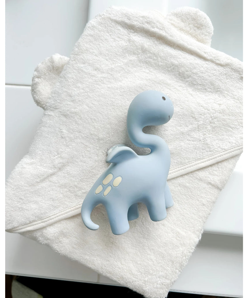 Winnie Parkes Diplo the Dino-Dragon teether in blue, soft silicone baby teether with dinosaur and dragon design, for infants.