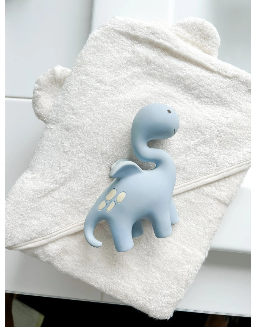 Winnie Parkes Diplo the Dino-Dragon teether in blue, soft silicone baby teether with dinosaur and dragon design, for infants.