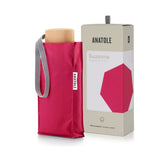 Pink Anatole Suzanne micro-umbrella open, compact umbrella with a floral pattern, designed for easy carrying and rain protection.
