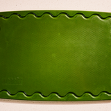 Maison Apprêt petite green chopping board, made of durable wood, ideal for food prep and serving in the kitchen.