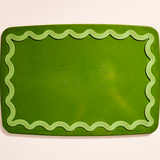 Maison Apprêt petite green chopping board with smooth wooden surface, ideal for kitchen prep and food serving.