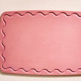 Pink Maison Apprêt Classique chopping board with smooth surface and rounded edges, ideal for food prep and serving.