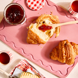 Pink Maison Apprêt Classique chopping board with a smooth surface and sturdy design, ideal for food preparation.