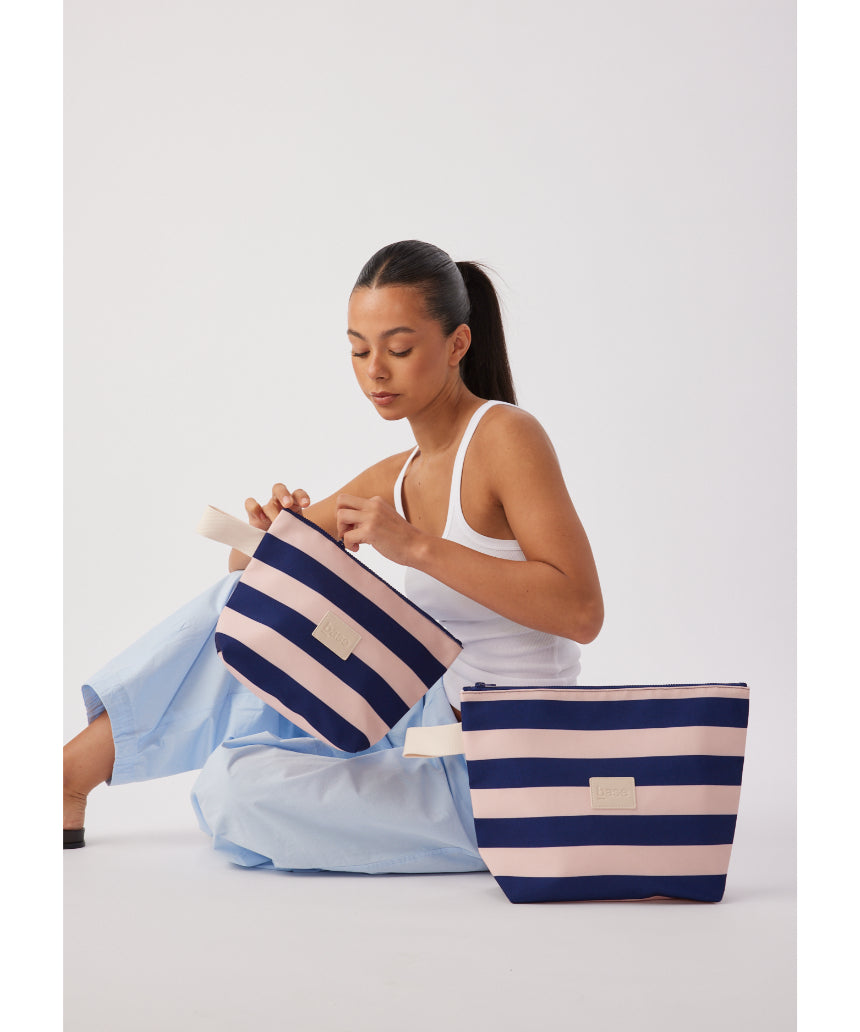 Wet Base Midi Regatta Stripe by Base, showcasing the stylish midi wetsuit with vibrant regatta stripe pattern and sleek design.
