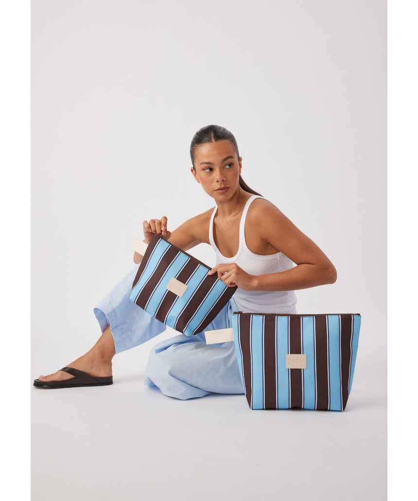 Wet Base Midi in Chocolate Stripe by Base, showcasing the stylish midi dress with a chocolate and white striped pattern.