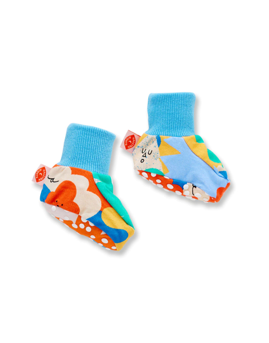 Halcyon Nights Mount Wiggly baby booties in soft fabric, designed for comfort and warmth for infants.