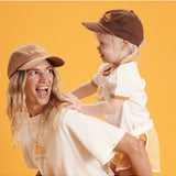 Banabae Rad Mama Washed Baseball Cap in Desert Sand, showing a soft, faded fabric cap with a curved brim and adjustable strap.