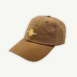 Banabae Rad Mama washed baseball cap in desert sand, showing a casual, distressed style with a curved brim and adjustable strap.
