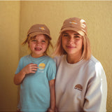 Banabae Rad Mama Washed Baseball Cap in desert sand, featuring a soft, worn-in fabric and curved brim for casual style.