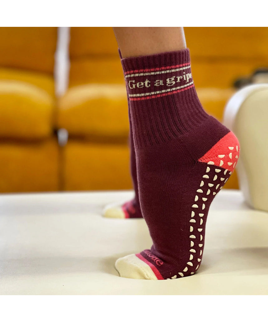 Banabae Get A Grip Socks in wine and pink with textured grip soles, designed for comfort and stability.
