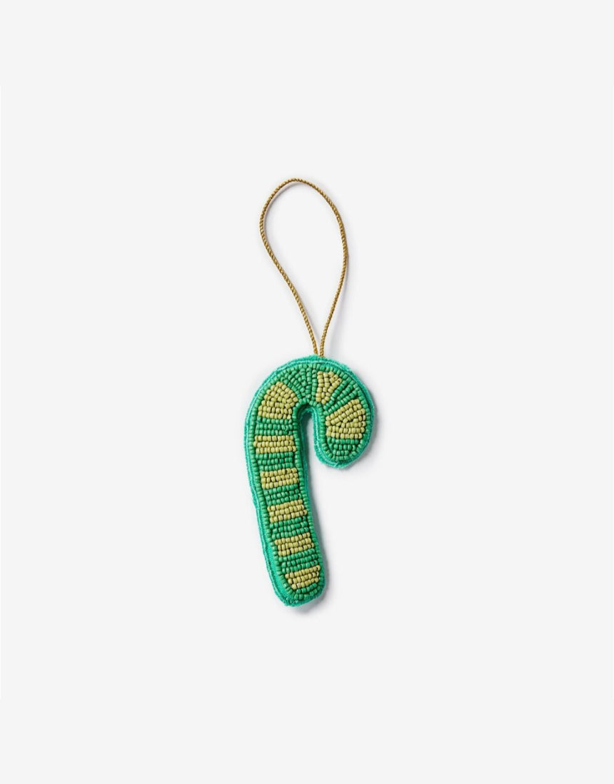 Bonnie and Neil beaded candy cane green Christmas decoration with red and white beads on a festive background