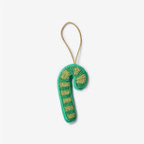Bonnie and Neil beaded candy cane green Christmas decoration with red and white beads on a festive background