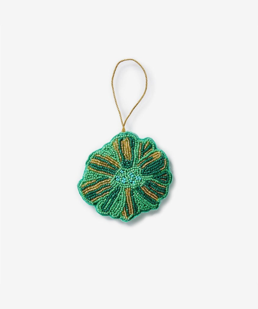 Green beaded flower Christmas decoration by Bonnie and Neil, featuring intricate beadwork and festive holiday design.