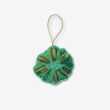 Green beaded flower Christmas decoration by Bonnie and Neil, featuring intricate beadwork and festive holiday design.