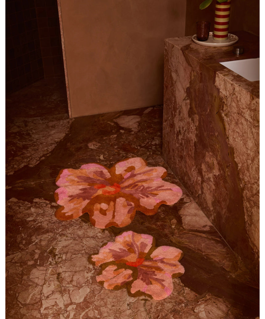 Bonnie and Neil Tulip Tan Bath Mat with soft textured surface, styled in a modern bathroom setting.