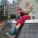 Merry People Bobbi Gumboots in teal, showcasing waterproof rubber footwear with a stylish, vibrant design.