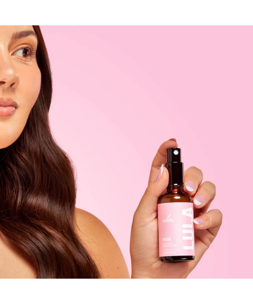 Lula Calm Mist essential oil bottle with a minimalist label, designed for soothing aromatherapy use.