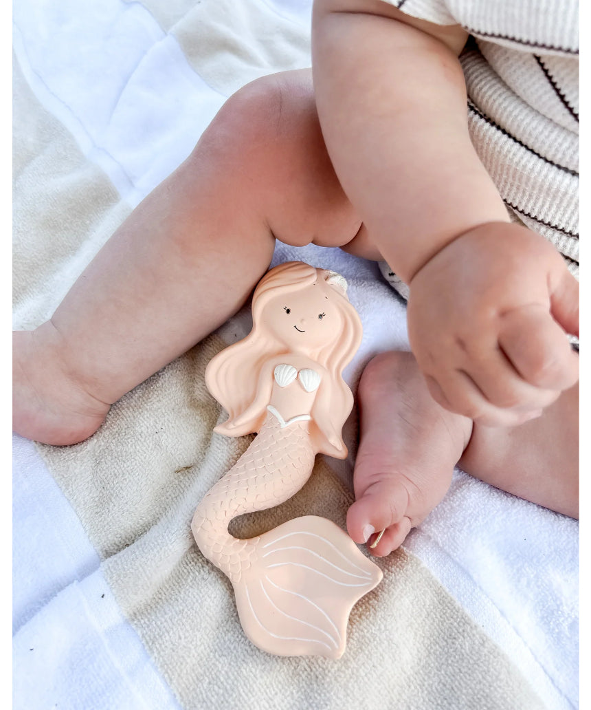 Winnie Parkes Maeve the Mermaid rubber teether in peach, soft and safe teething toy for babies, with detailed mermaid design.